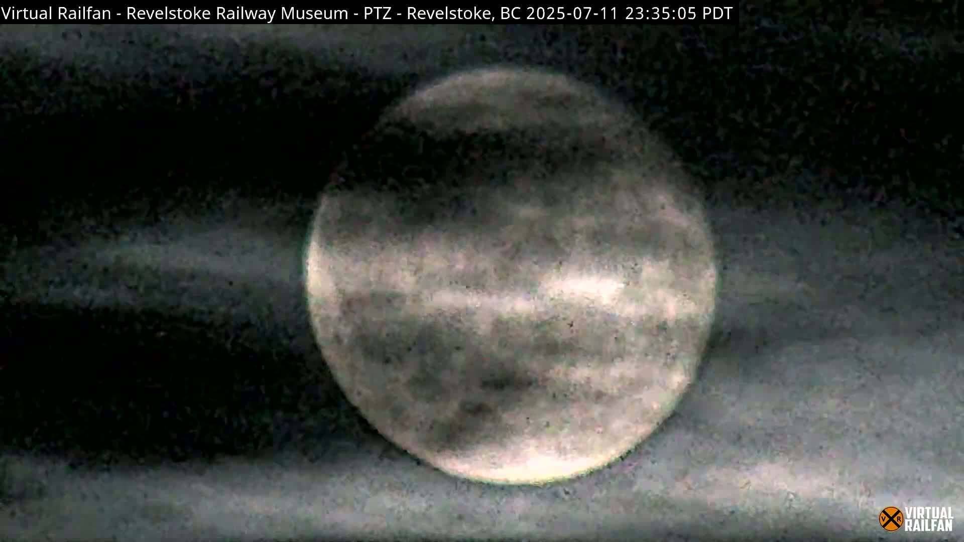 Revelstoke City & Canadian Pacific Railway Railroad Crossing Live Cam - Revelstoke, Columbia-Shuswap, British Columbia, Canada  PTZ | Virtual Railfan LIVE ! 2025-03-18 12:14