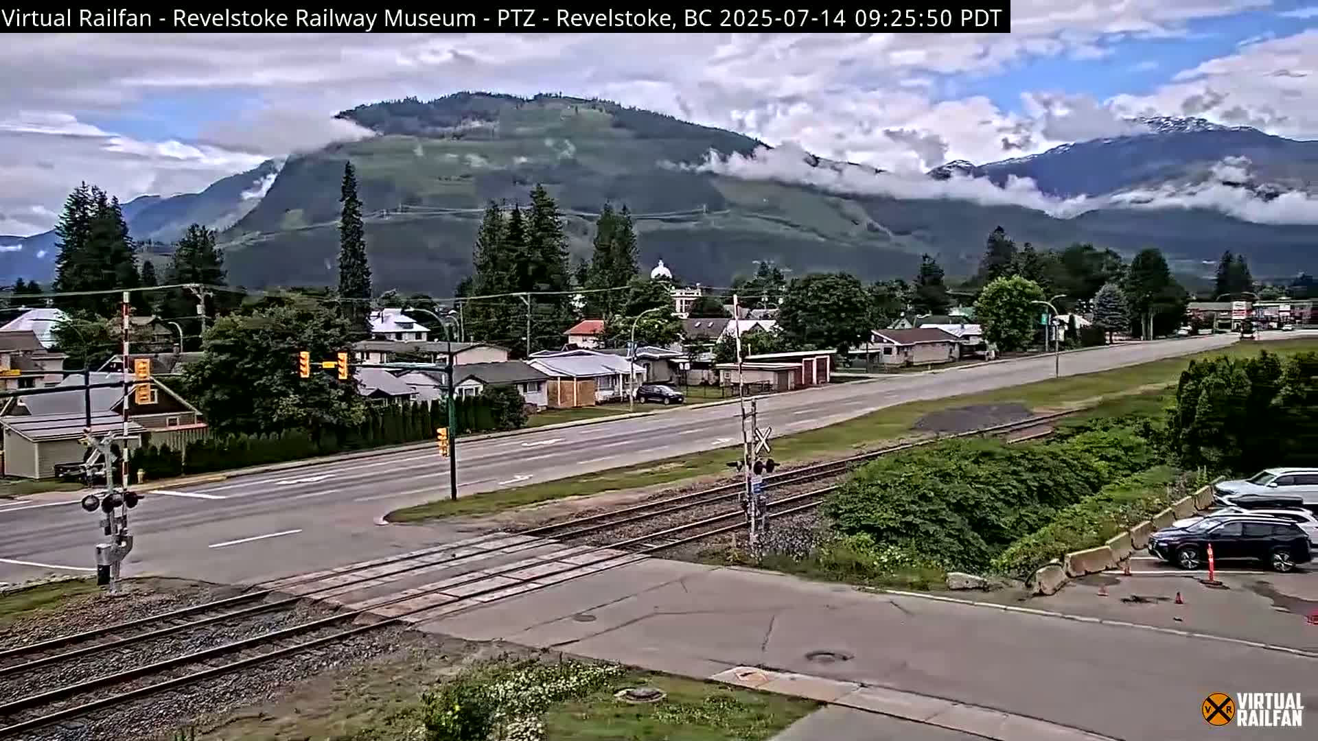 Revelstoke City & Canadian Pacific Railway Railroad Crossing Live Cam - Revelstoke, Columbia-Shuswap, British Columbia, Canada  PTZ | Virtual Railfan LIVE ! 2025-03-18 12:14