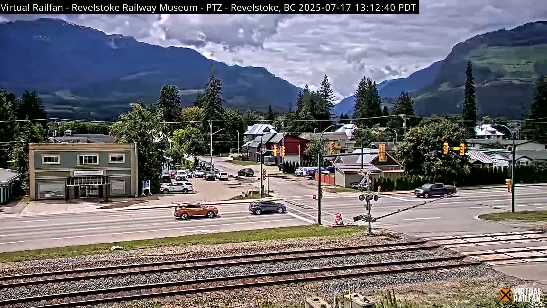 Revelstoke City & Canadian Pacific Railway Railroad Crossing Live Cam - Revelstoke, Columbia-Shuswap, British Columbia, Canada  PTZ | Virtual Railfan LIVE ! 2025-03-18 12:14
