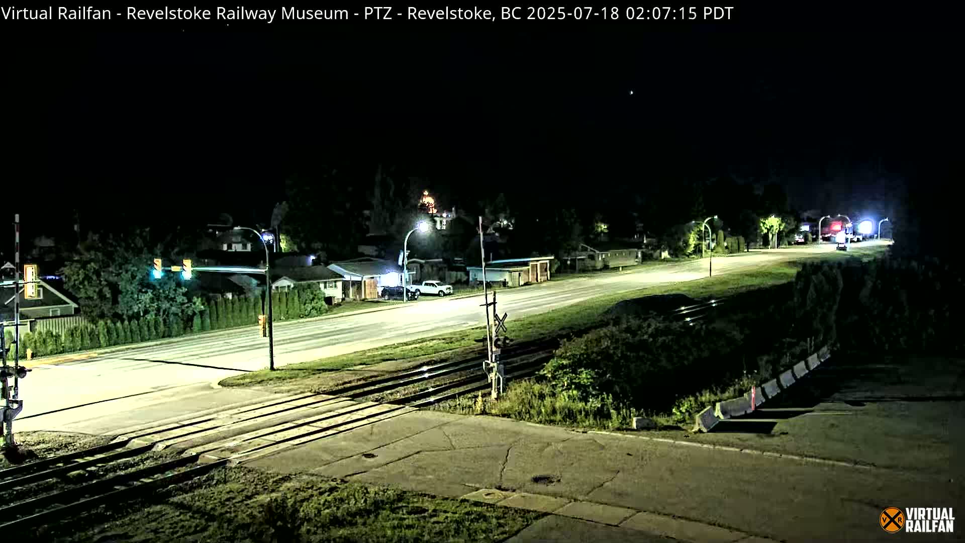 Revelstoke City & Canadian Pacific Railway Railroad Crossing Live Cam - Revelstoke, Columbia-Shuswap, British Columbia, Canada  PTZ | Virtual Railfan LIVE ! 2025-03-18 12:14