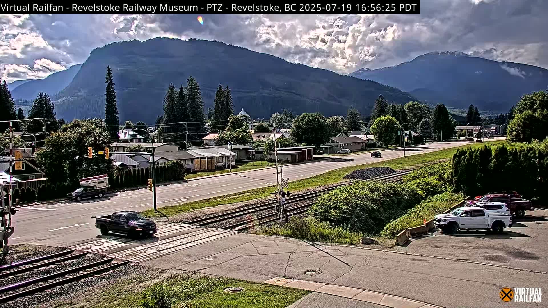 Revelstoke City & Canadian Pacific Railway Railroad Crossing Live Cam - Revelstoke, Columbia-Shuswap, British Columbia, Canada  PTZ | Virtual Railfan LIVE ! 2025-03-18 12:14