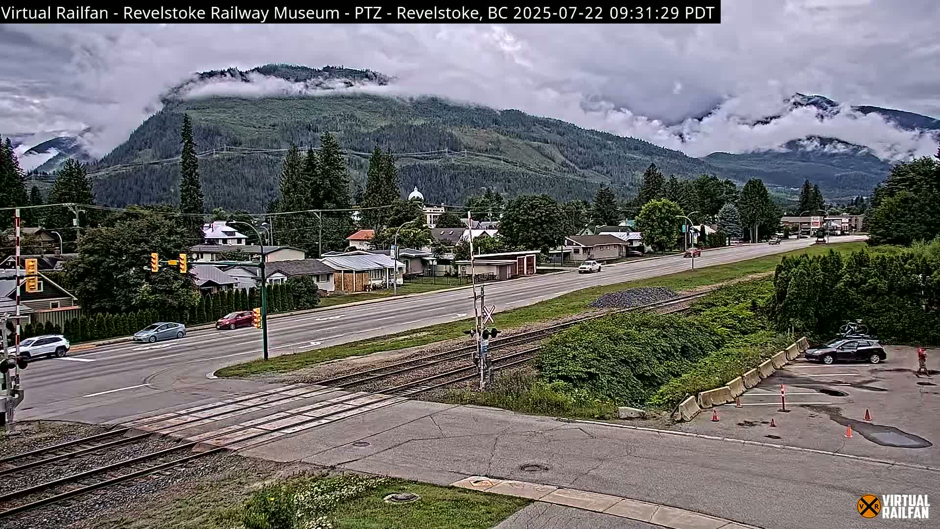 Revelstoke City & Canadian Pacific Railway Railroad Crossing Live Cam - Revelstoke, Columbia-Shuswap, British Columbia, Canada  PTZ | Virtual Railfan LIVE ! 2025-03-18 12:14