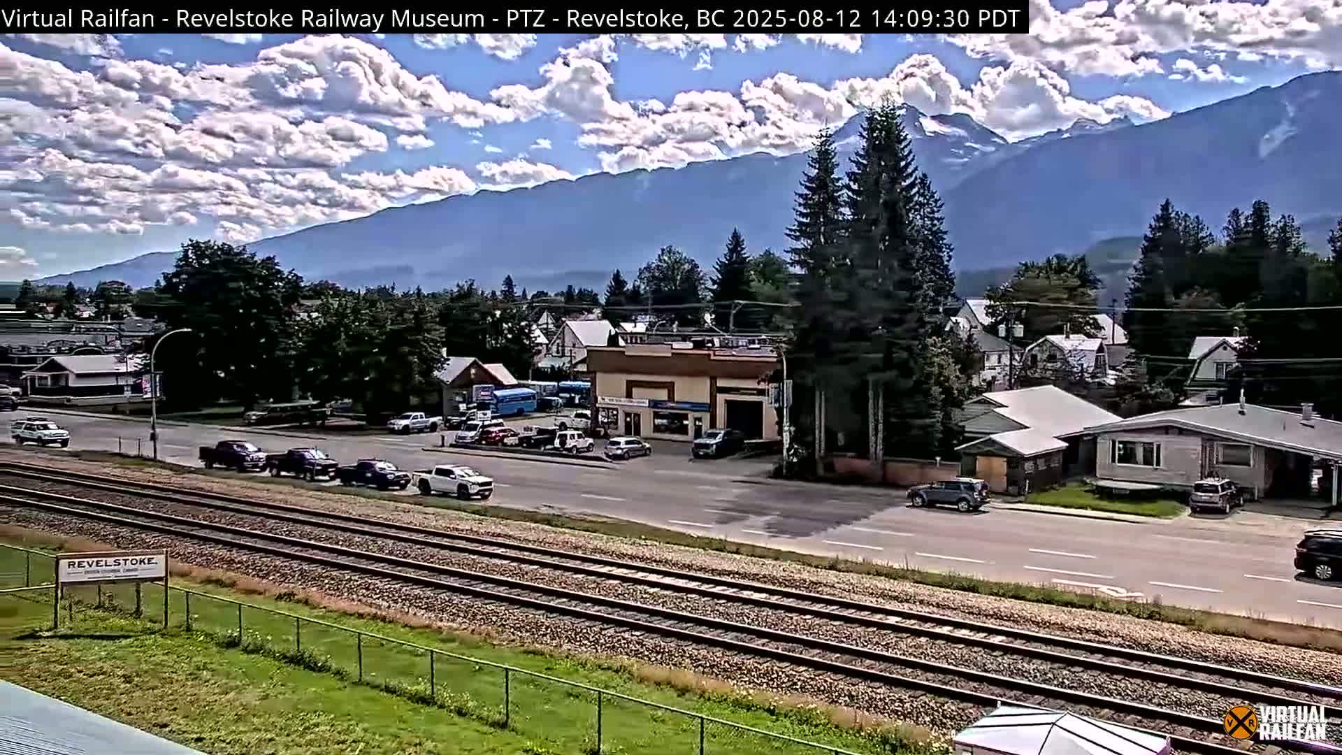 Revelstoke City & Canadian Pacific Railway Railroad Crossing Live Cam - Revelstoke, Columbia-Shuswap, British Columbia, Canada  PTZ | Virtual Railfan LIVE ! 2025-03-18 12:14