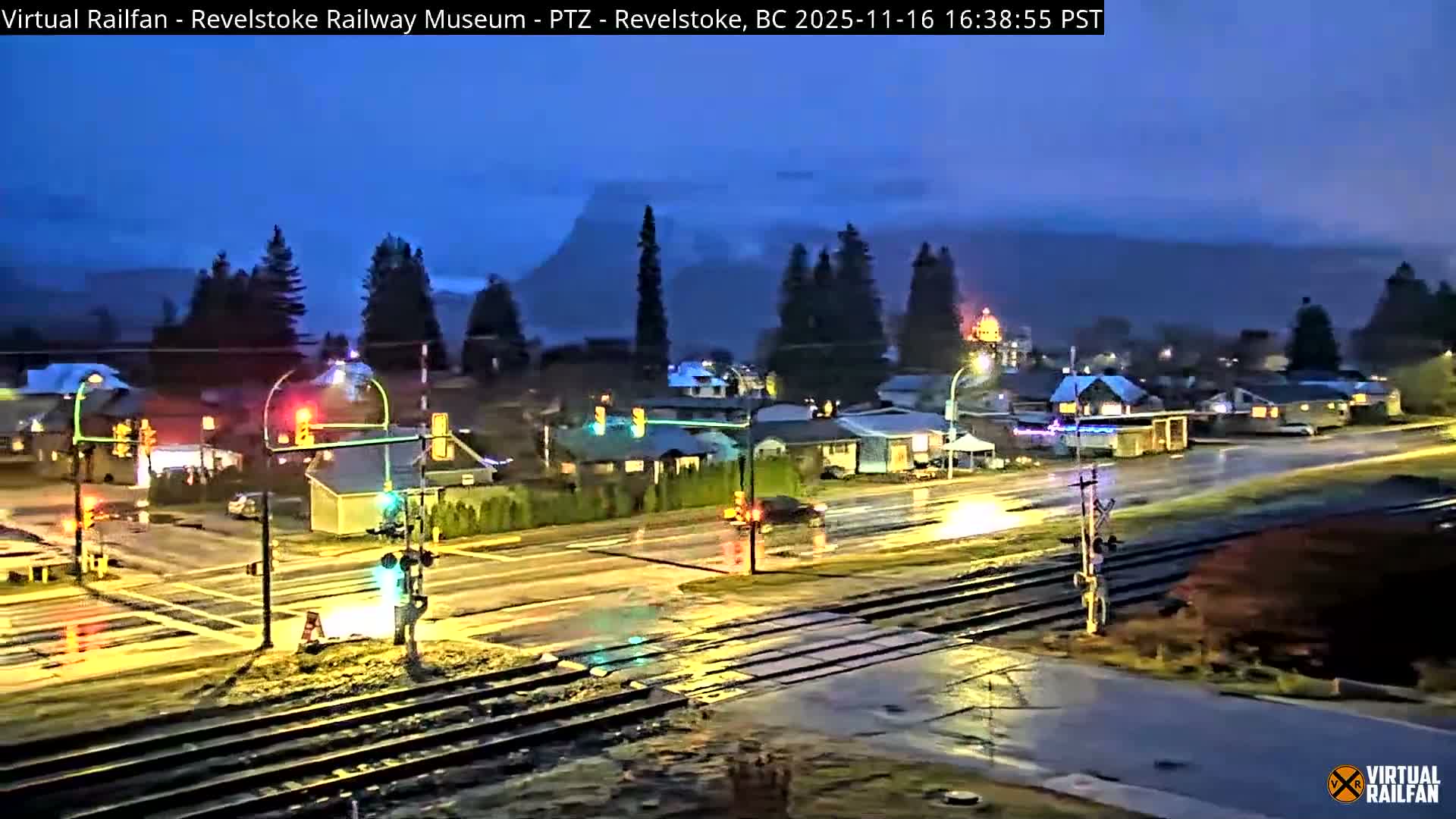 Revelstoke City & Canadian Pacific Railway Railroad Crossing Live Cam - Revelstoke, Columbia-Shuswap, British Columbia, Canada  PTZ | Virtual Railfan LIVE ! 2025-03-18 12:14