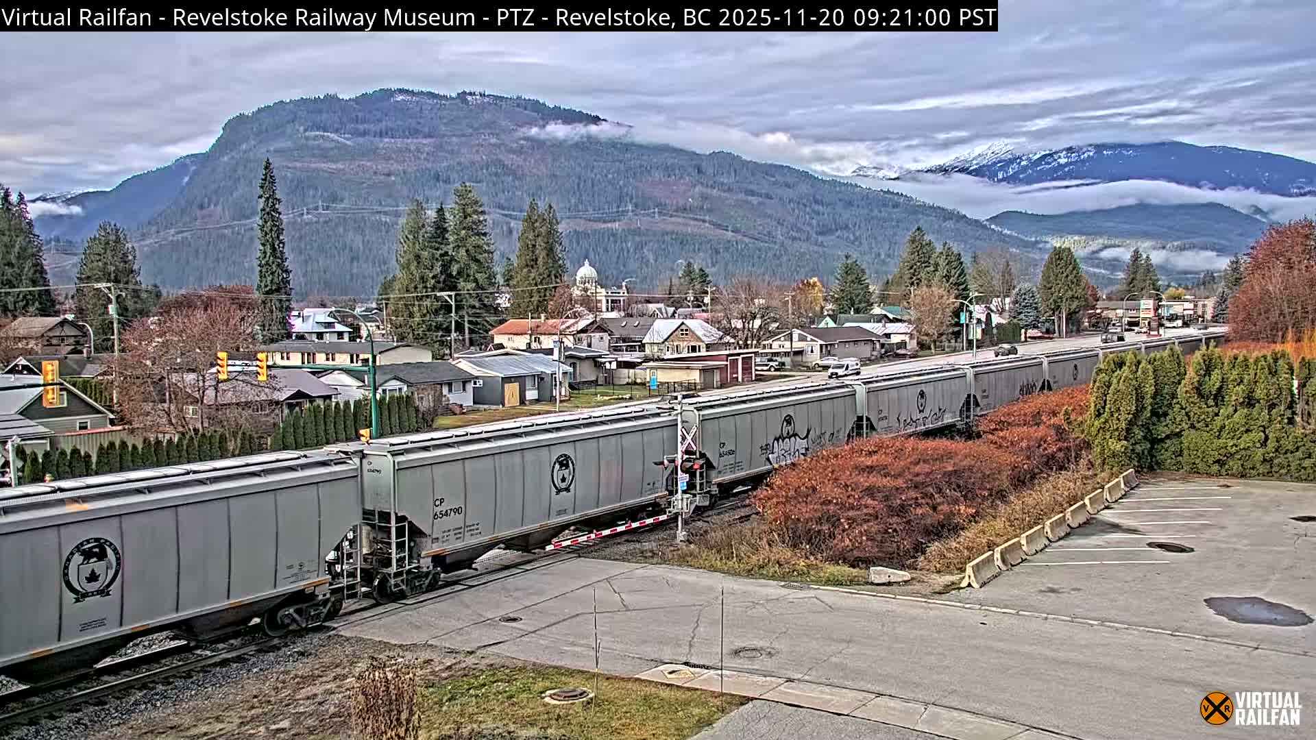 Revelstoke City & Canadian Pacific Railway Railroad Crossing Live Cam - Revelstoke, Columbia-Shuswap, British Columbia, Canada  PTZ | Virtual Railfan LIVE ! 2025-03-18 12:14