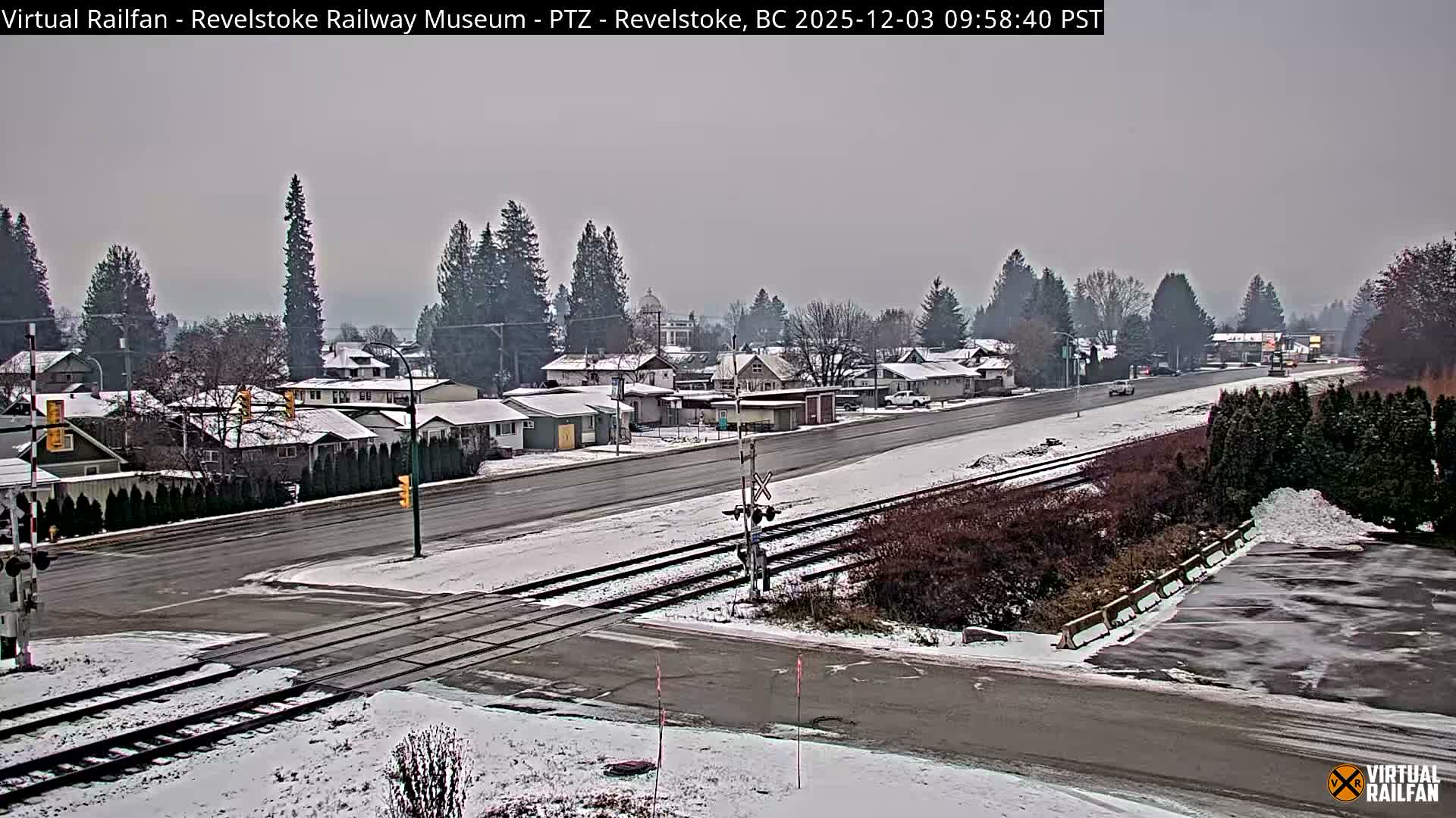 Revelstoke City & Canadian Pacific Railway Railroad Crossing Live Cam - Revelstoke, Columbia-Shuswap, British Columbia, Canada  PTZ | Virtual Railfan LIVE ! 2025-03-18 12:14