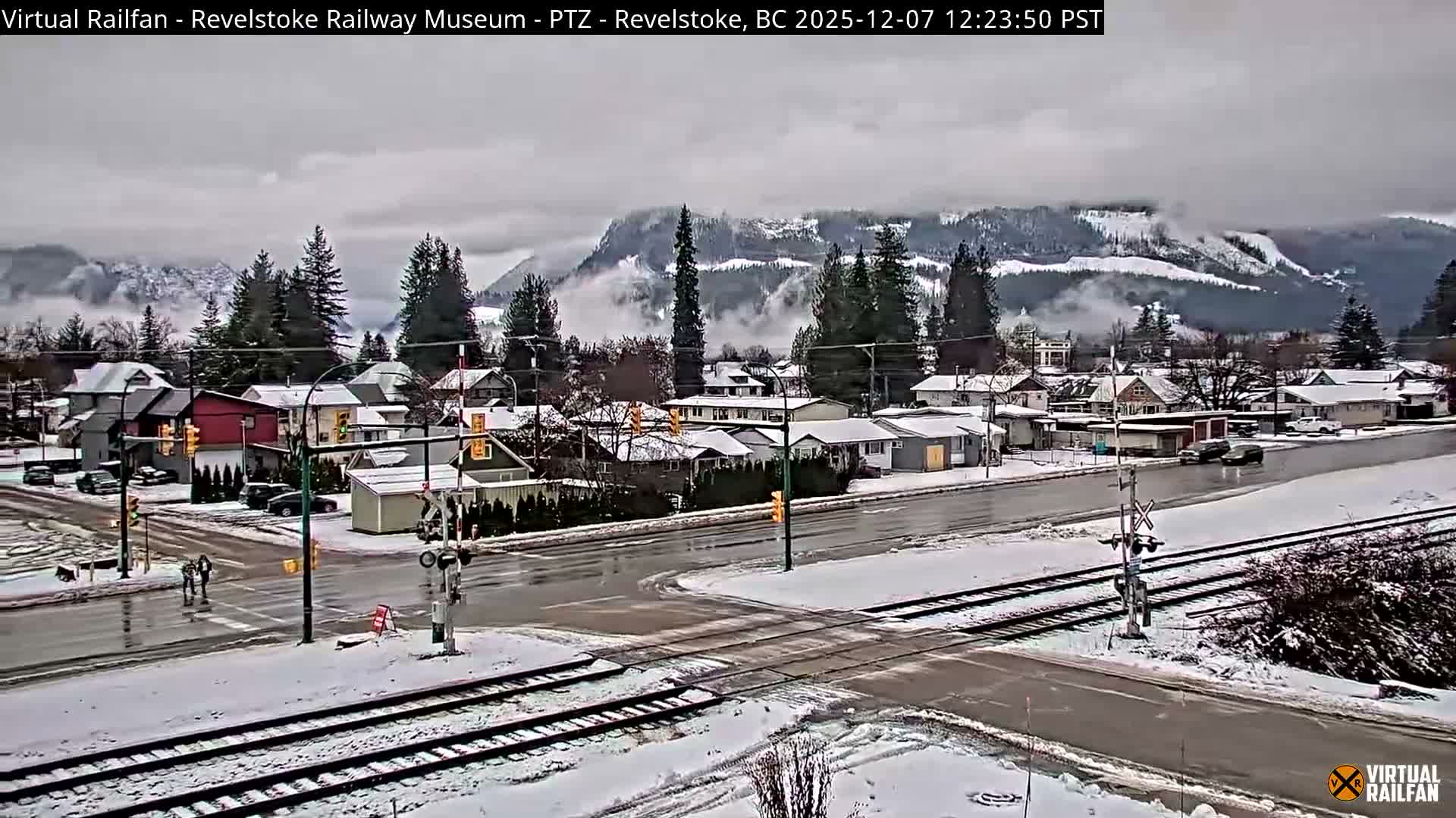 Revelstoke City & Canadian Pacific Railway Railroad Crossing Live Cam - Revelstoke, Columbia-Shuswap, British Columbia, Canada  PTZ | Virtual Railfan LIVE ! 2025-03-18 12:14