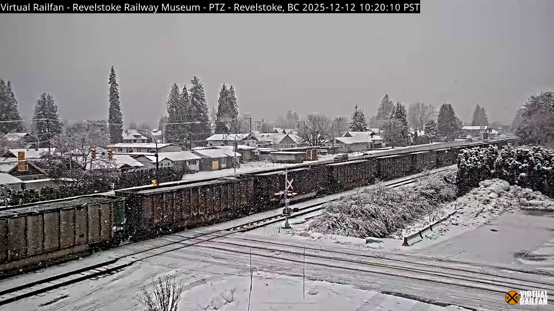 Revelstoke City & Canadian Pacific Railway Railroad Crossing Live Cam - Revelstoke, Columbia-Shuswap, British Columbia, Canada  PTZ | Virtual Railfan LIVE ! 2025-03-18 12:14