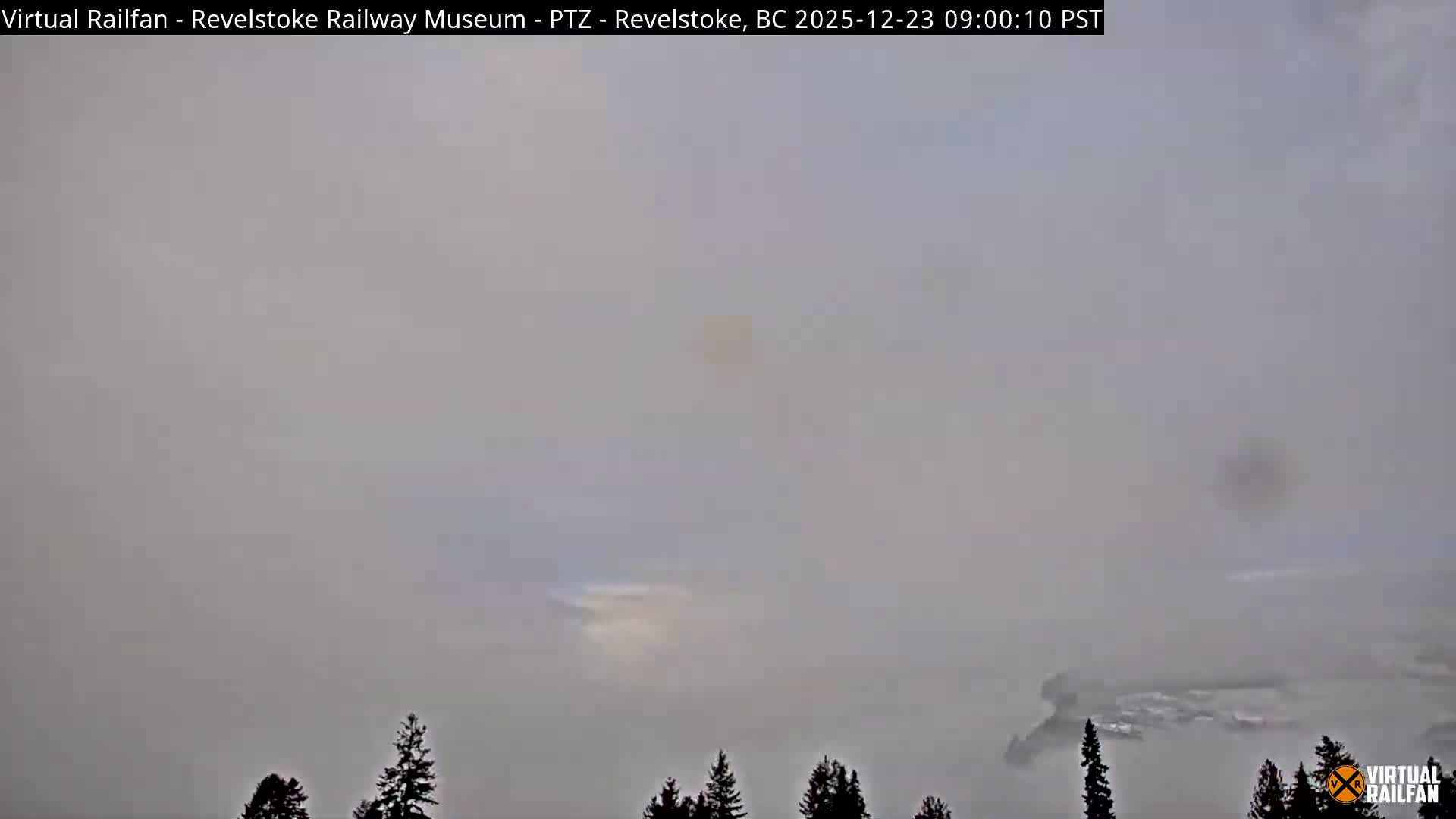 Revelstoke City & Canadian Pacific Railway Railroad Crossing Live Cam - Revelstoke, Columbia-Shuswap, British Columbia, Canada  PTZ | Virtual Railfan LIVE ! 2025-03-18 12:14