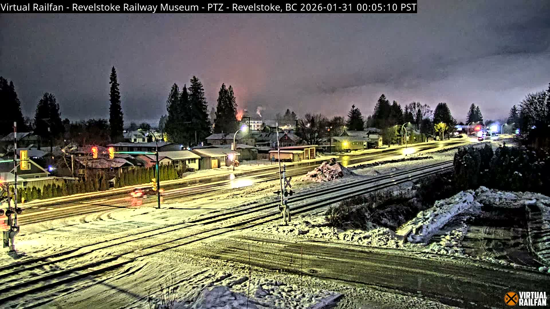Revelstoke City & Canadian Pacific Railway Railroad Crossing Live Cam - Revelstoke, Columbia-Shuswap, British Columbia, Canada  PTZ | Virtual Railfan LIVE ! 2025-03-18 12:14