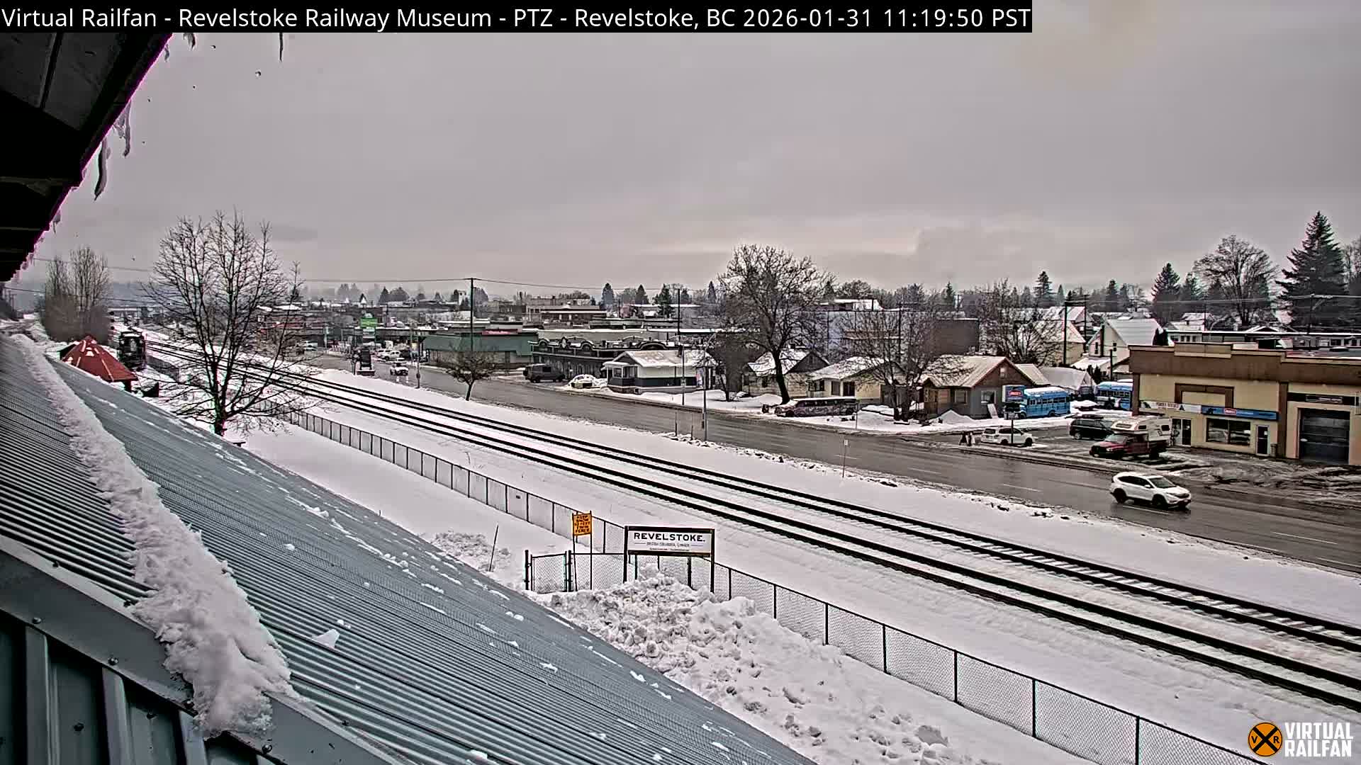 Revelstoke City & Canadian Pacific Railway Railroad Crossing Live Cam - Revelstoke, Columbia-Shuswap, British Columbia, Canada  PTZ | Virtual Railfan LIVE ! 2025-03-18 12:14