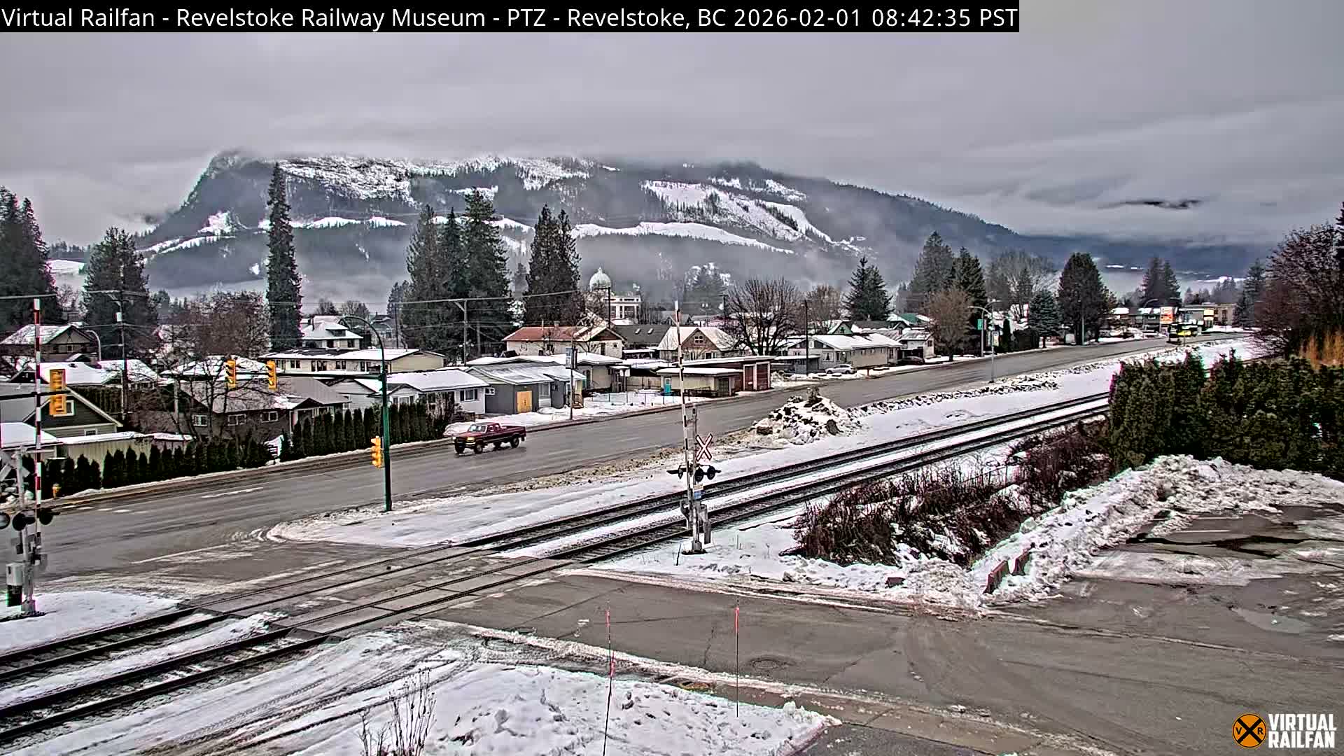 Revelstoke City & Canadian Pacific Railway Railroad Crossing Live Cam - Revelstoke, Columbia-Shuswap, British Columbia, Canada  PTZ | Virtual Railfan LIVE ! 2025-03-18 12:14