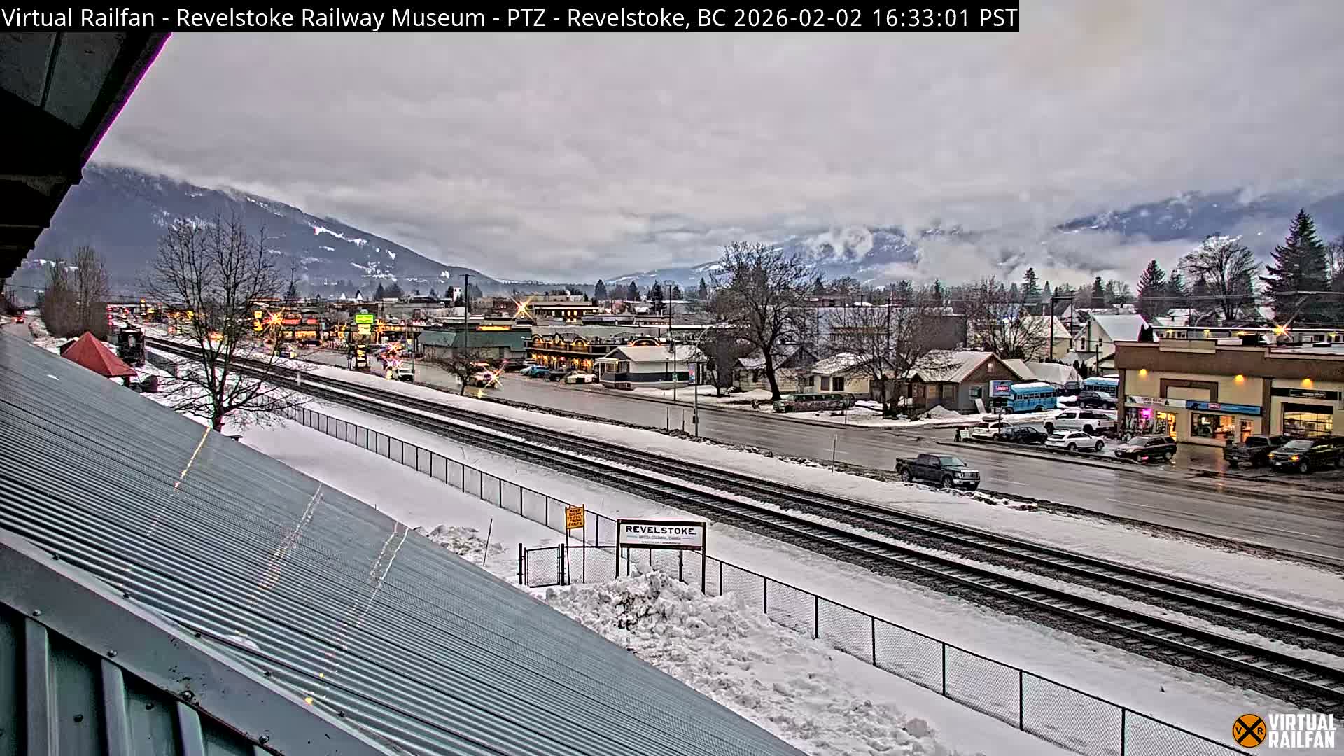 Revelstoke City & Canadian Pacific Railway Railroad Crossing Live Cam - Revelstoke, Columbia-Shuswap, British Columbia, Canada  PTZ | Virtual Railfan LIVE ! 2025-03-18 12:14