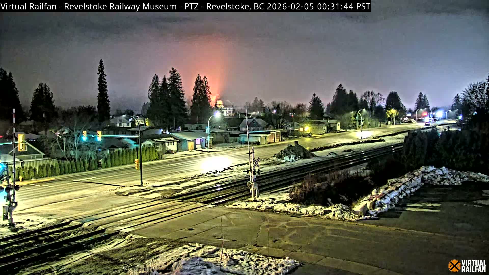 Revelstoke City & Canadian Pacific Railway Railroad Crossing Live Cam - Revelstoke, Columbia-Shuswap, British Columbia, Canada  PTZ | Virtual Railfan LIVE ! 2025-03-18 12:14