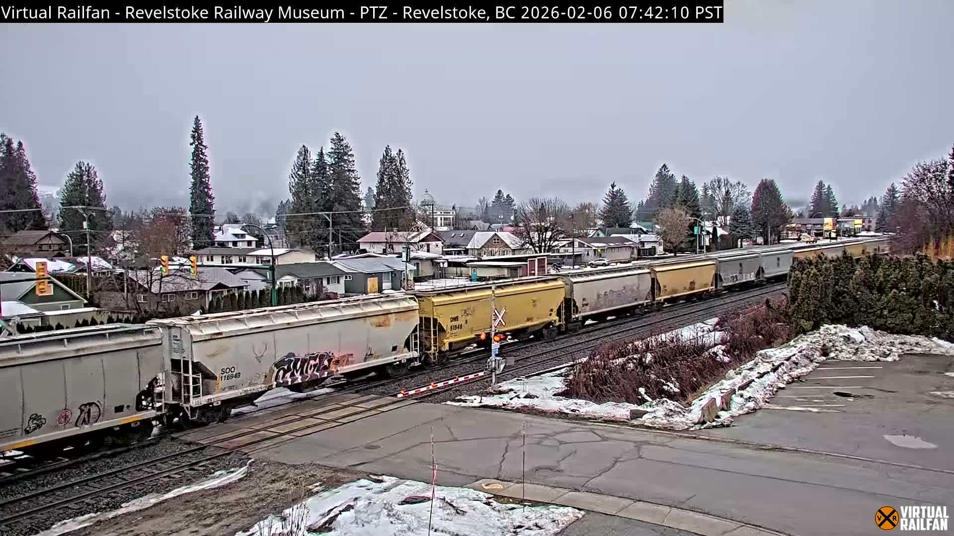 Revelstoke City & Canadian Pacific Railway Railroad Crossing Live Cam - Revelstoke, Columbia-Shuswap, British Columbia, Canada  PTZ | Virtual Railfan LIVE ! 2025-03-18 12:14