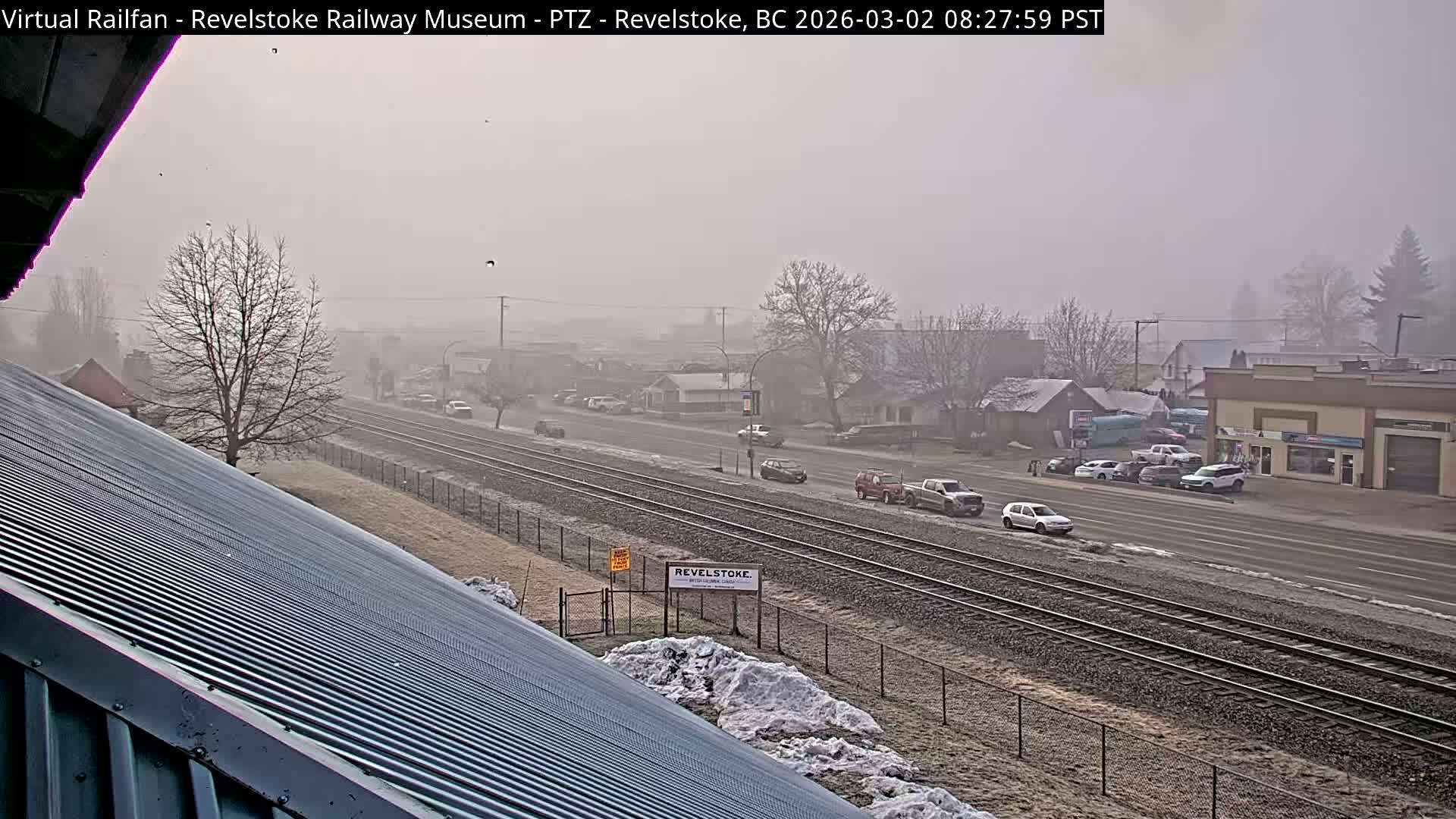 Revelstoke City & Canadian Pacific Railway Railroad Crossing Live Cam - Revelstoke, Columbia-Shuswap, British Columbia, Canada  PTZ | Virtual Railfan LIVE ! 2025-03-18 12:14