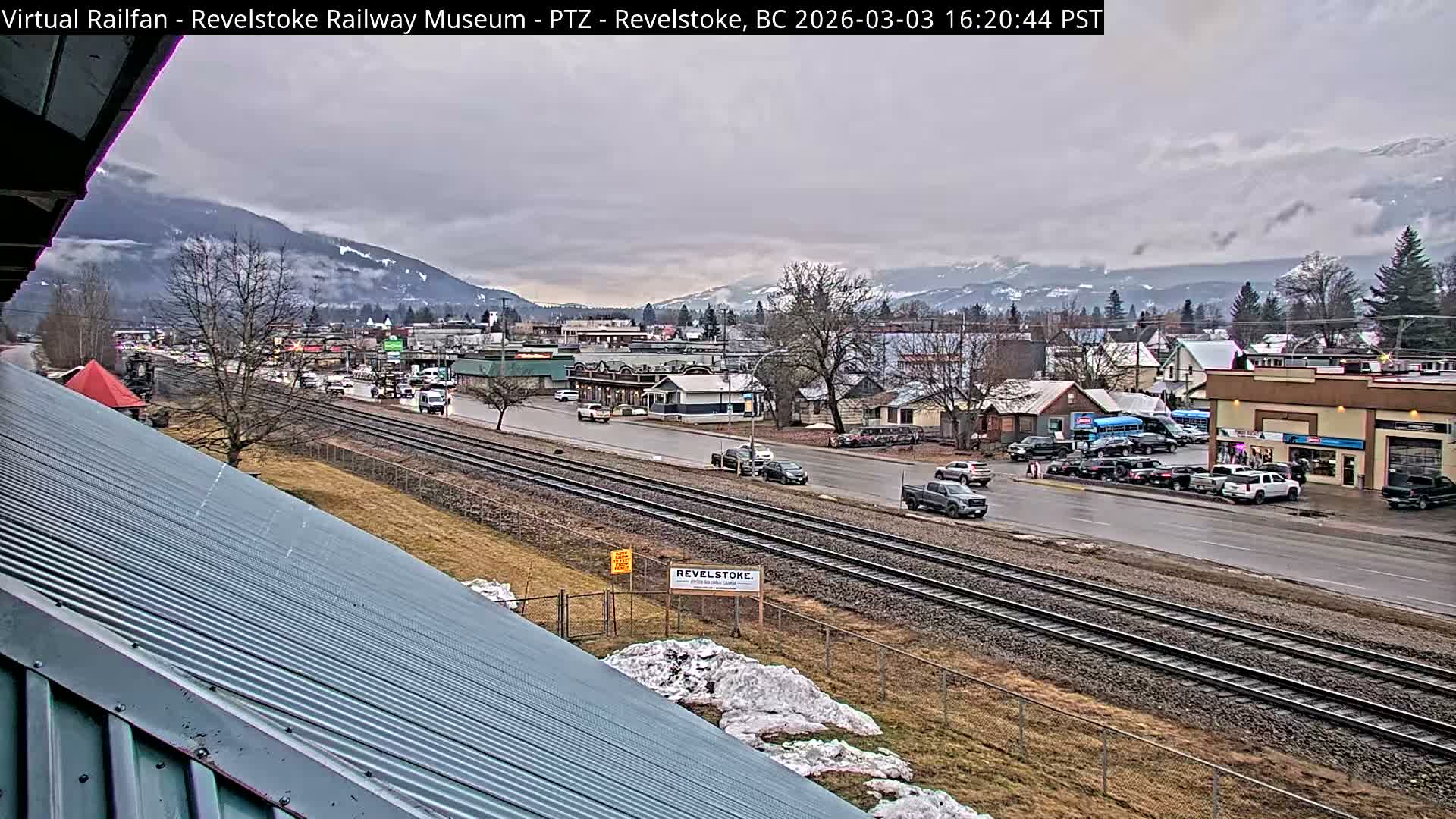 Revelstoke City & Canadian Pacific Railway Railroad Crossing Live Cam - Revelstoke, Columbia-Shuswap, British Columbia, Canada  PTZ | Virtual Railfan LIVE ! 2025-03-18 12:14