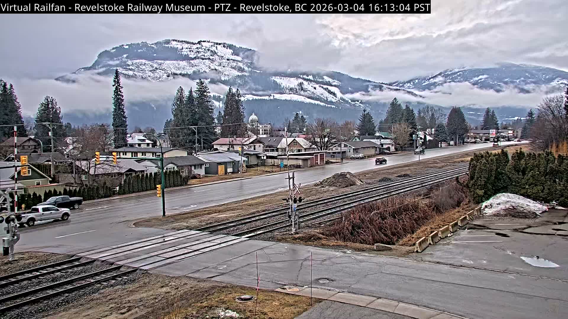 Revelstoke City & Canadian Pacific Railway Railroad Crossing Live Cam - Revelstoke, Columbia-Shuswap, British Columbia, Canada  PTZ | Virtual Railfan LIVE ! 2025-03-18 12:14