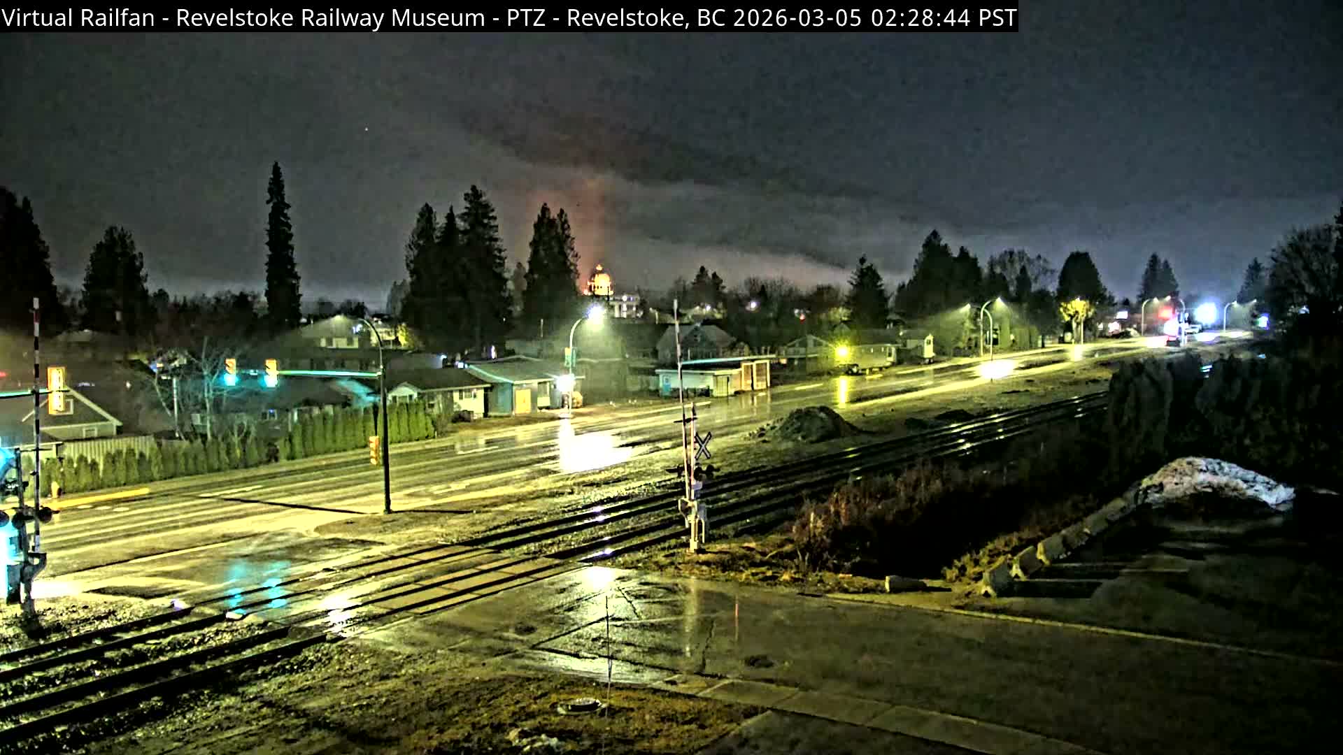 Revelstoke City & Canadian Pacific Railway Railroad Crossing Live Cam - Revelstoke, Columbia-Shuswap, British Columbia, Canada  PTZ | Virtual Railfan LIVE ! 2025-03-18 12:14