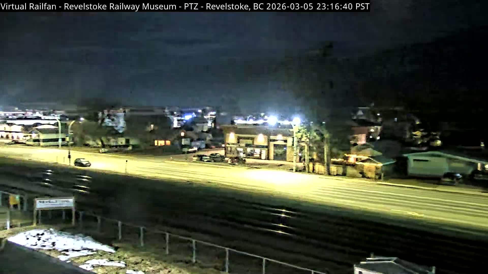 Revelstoke City & Canadian Pacific Railway Railroad Crossing Live Cam - Revelstoke, Columbia-Shuswap, British Columbia, Canada  PTZ | Virtual Railfan LIVE ! 2025-03-18 12:14
