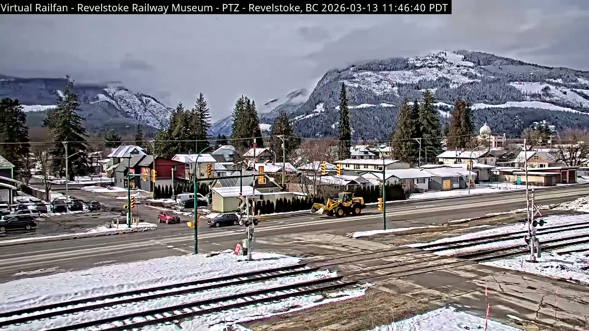 Revelstoke City & Canadian Pacific Railway Railroad Crossing Live Cam - Revelstoke, Columbia-Shuswap, British Columbia, Canada  PTZ | Virtual Railfan LIVE ! 2025-03-18 12:14
