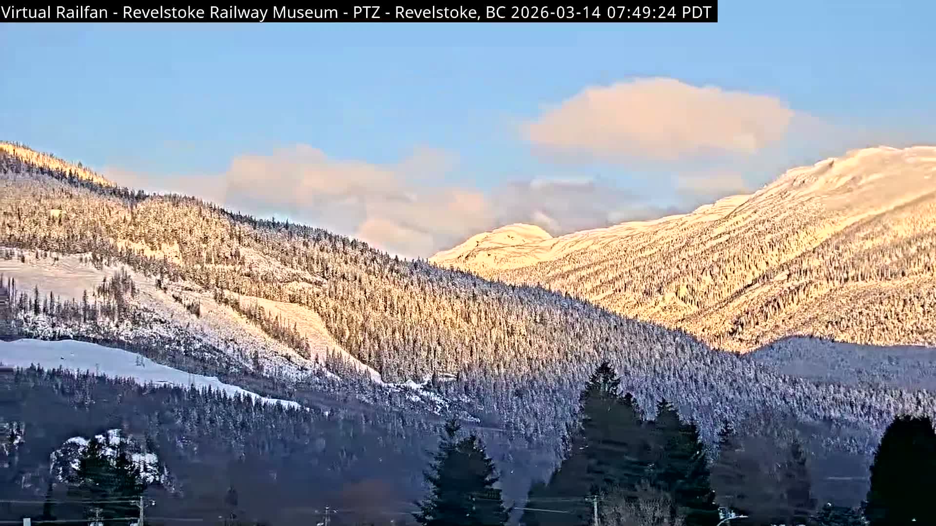Revelstoke City & Canadian Pacific Railway Railroad Crossing Live Cam - Revelstoke, Columbia-Shuswap, British Columbia, Canada  PTZ | Virtual Railfan LIVE ! 2025-03-18 12:14