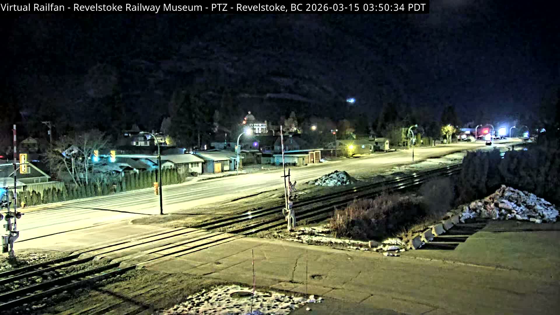 Revelstoke City & Canadian Pacific Railway Railroad Crossing Live Cam - Revelstoke, Columbia-Shuswap, British Columbia, Canada  PTZ | Virtual Railfan LIVE ! 2025-03-18 12:14