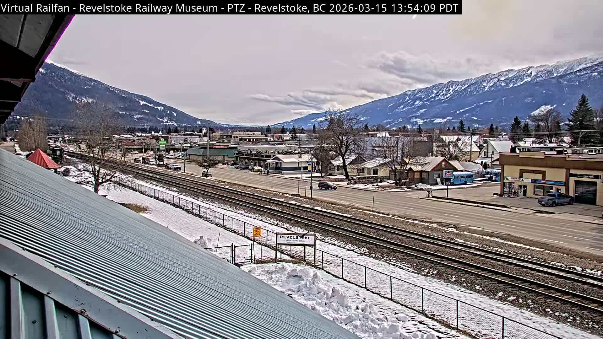 Revelstoke City & Canadian Pacific Railway Railroad Crossing Live Cam - Revelstoke, Columbia-Shuswap, British Columbia, Canada  PTZ | Virtual Railfan LIVE ! 2025-03-18 12:14