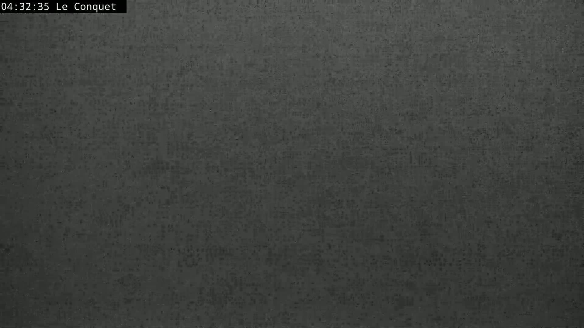 The image shows a dark gray textured surface.