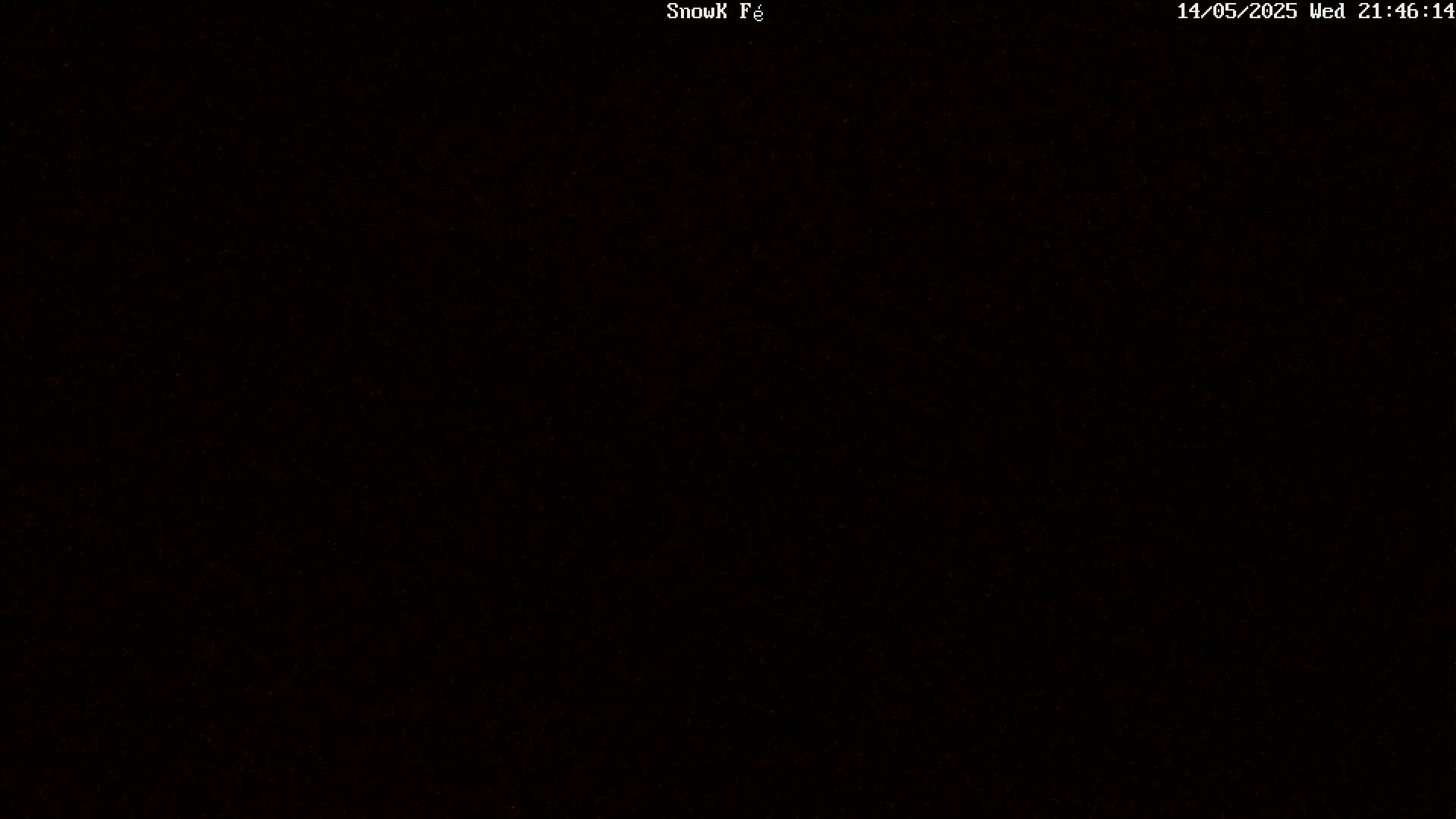 The image is a completely black field with slightly visible noise.