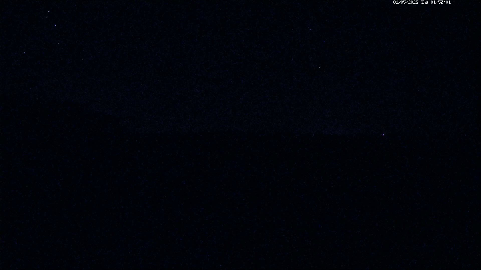 A night sky filled with stars is shown under clear conditions.