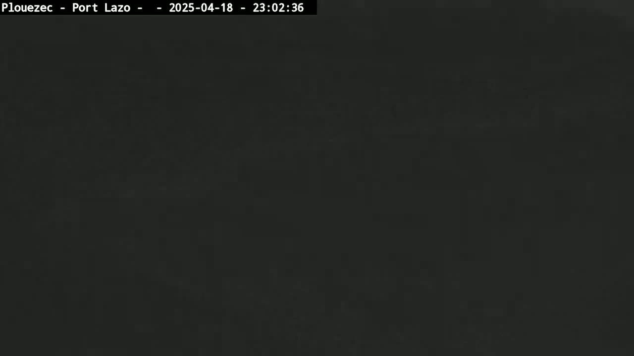 The image is a completely dark, uniformly colored, possibly nighttime shot.