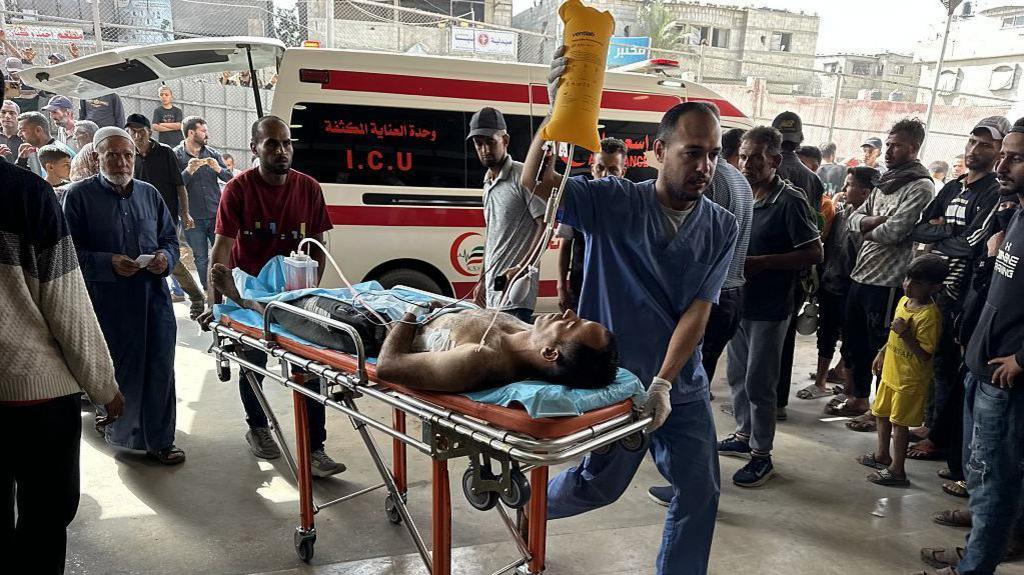 Gaza: Dozens Killed by Israeli Fire While Awaiting Aid, Officials Say