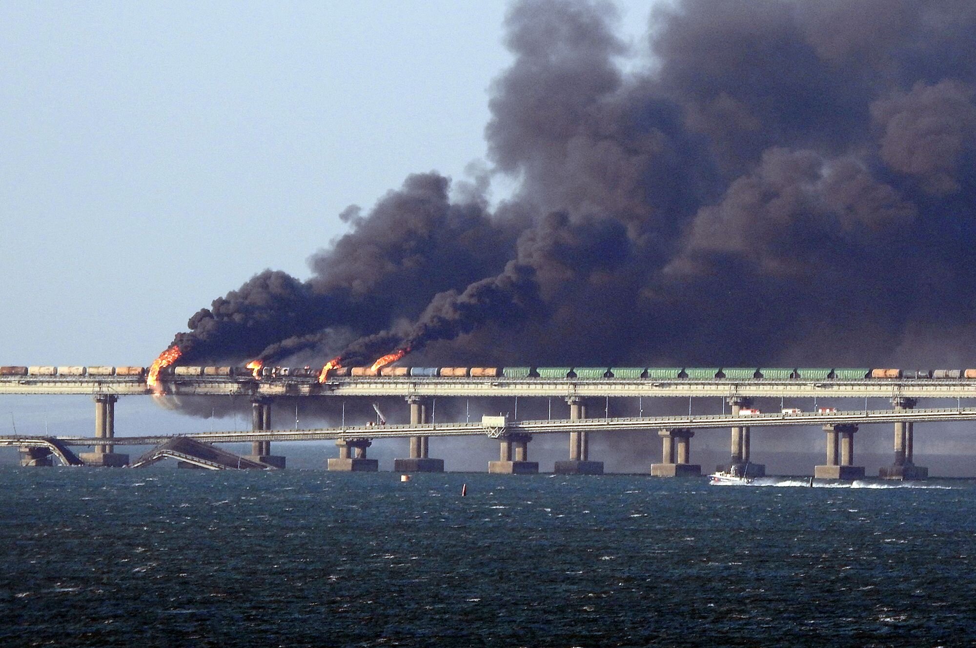 Ukraine hits bridge linking Crimea to Russia with underwater explosives - The Guardian