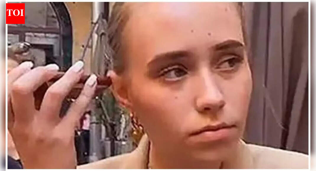 Putin's Alleged Daughter Luiza Rozova Expresses Sorrow for Ukraine War After Paris Confrontation with Ukrainian Journalist