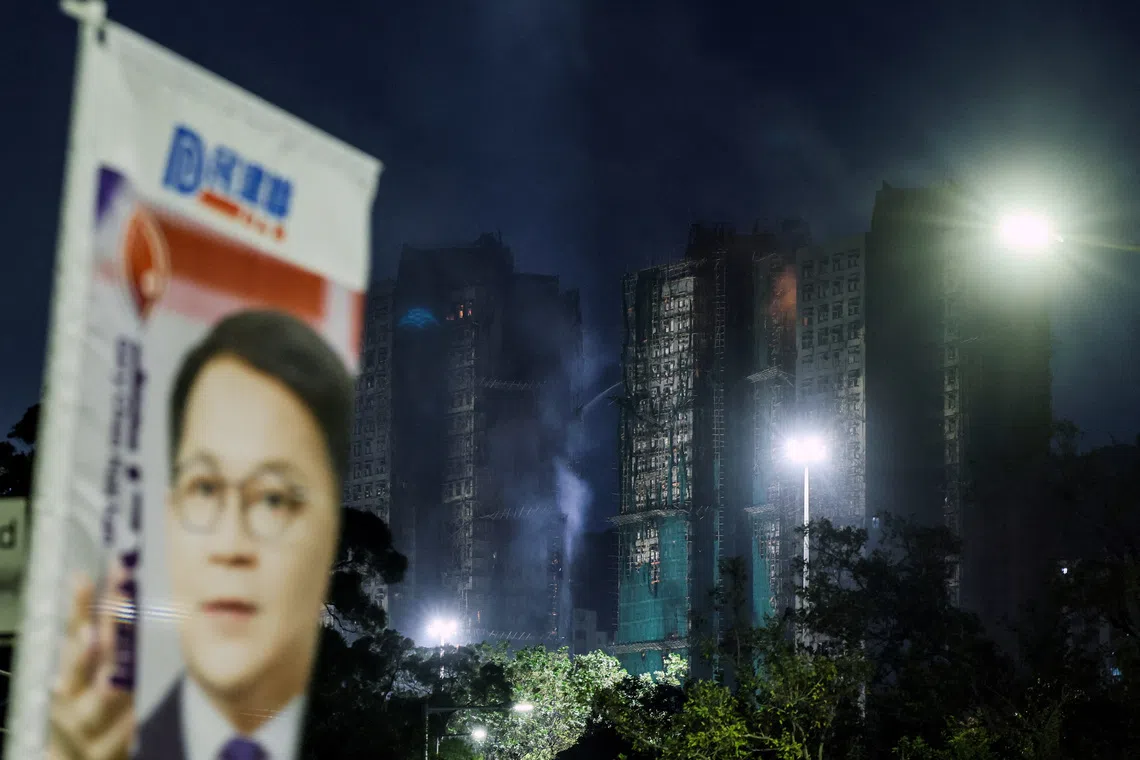 Hong Kong Elections: Deadly Blaze & "Patriots Only" Rule Dampen Voter Turnout Amidst National Security Crackdown
