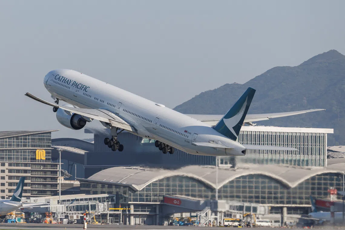 Cathay Pacific Flight Incident: Passenger Arrested for Attempting to Open Door Mid-Flight from Boston to Hong Kong