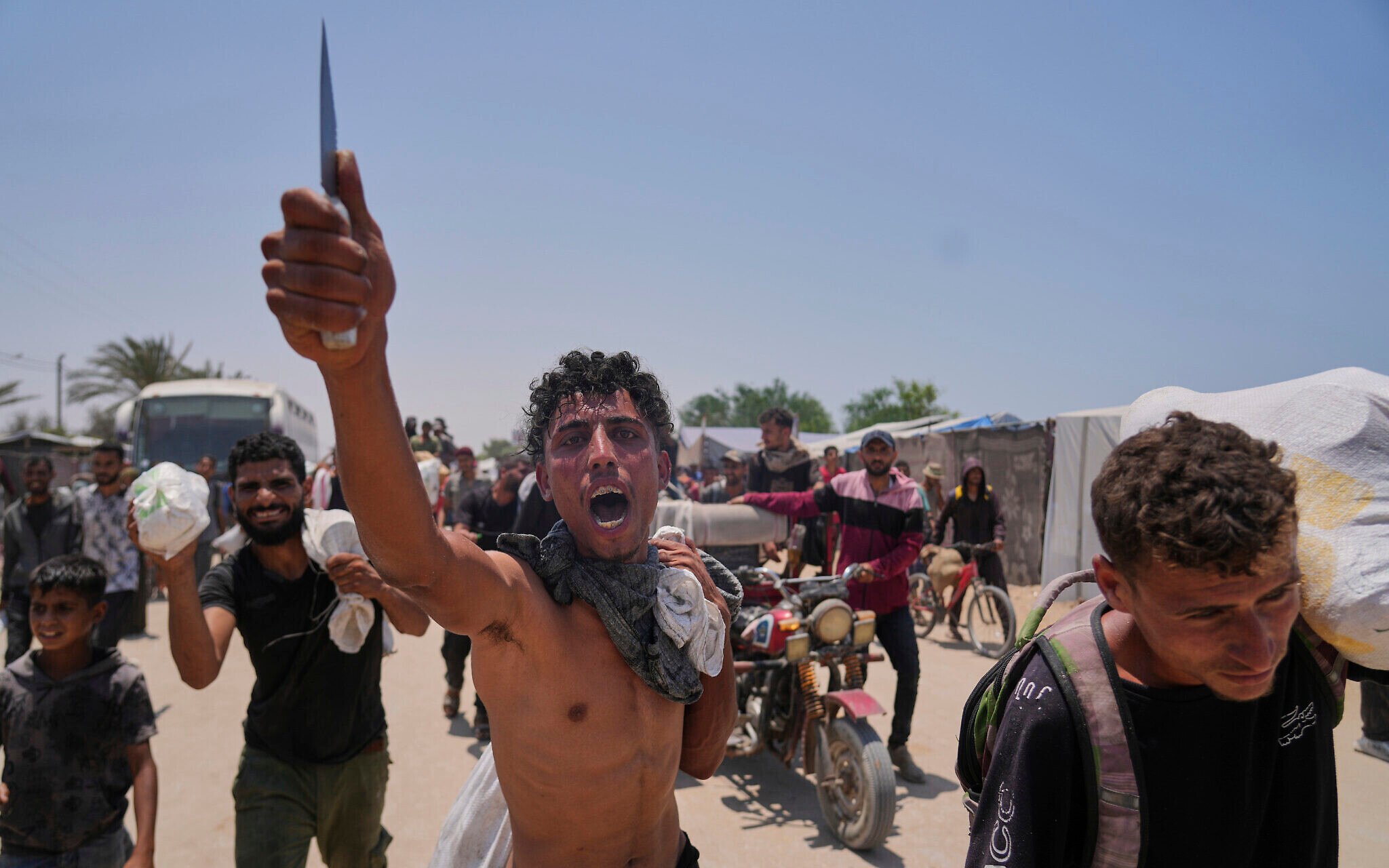 Gaza: Aid Group Reports 8 Local Workers Killed, 21 Injured