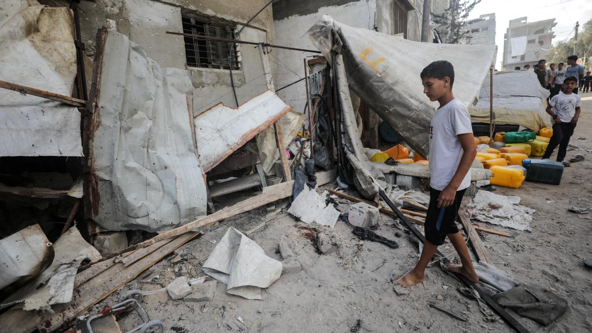 Gaza Father's Anguish: Son Killed in Israeli Strike While Seeking Water