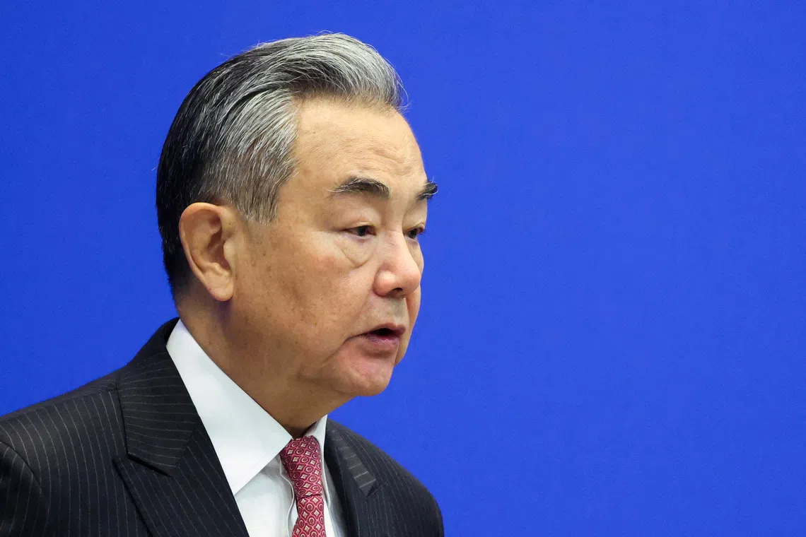 China 'Shocked' by Japan's Taiwan Stance: Wang Yi Accuses PM of Military Intervention Threat, Escalating Crisis