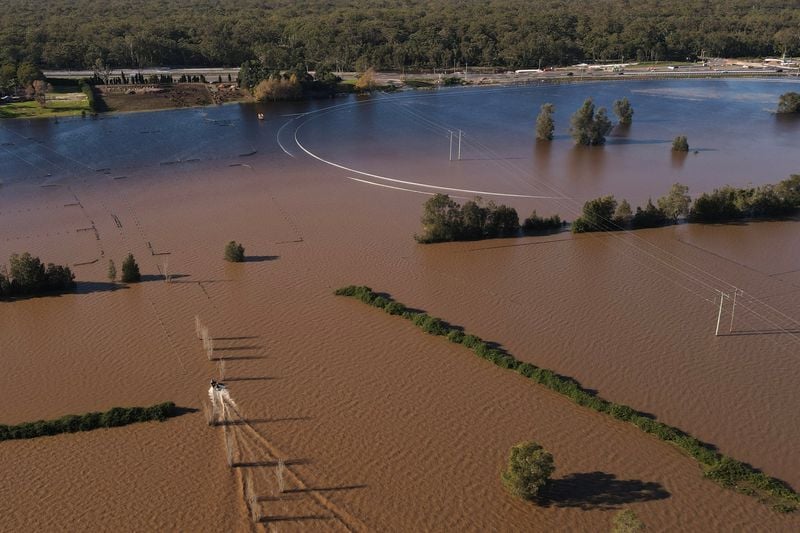Australia Flood Cleanup Begins After Fatalities and Property Damage