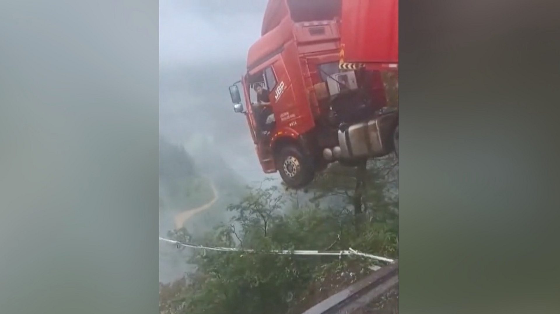 China Bridge Collapse: Truck Dangles After Landslide in Guizhou