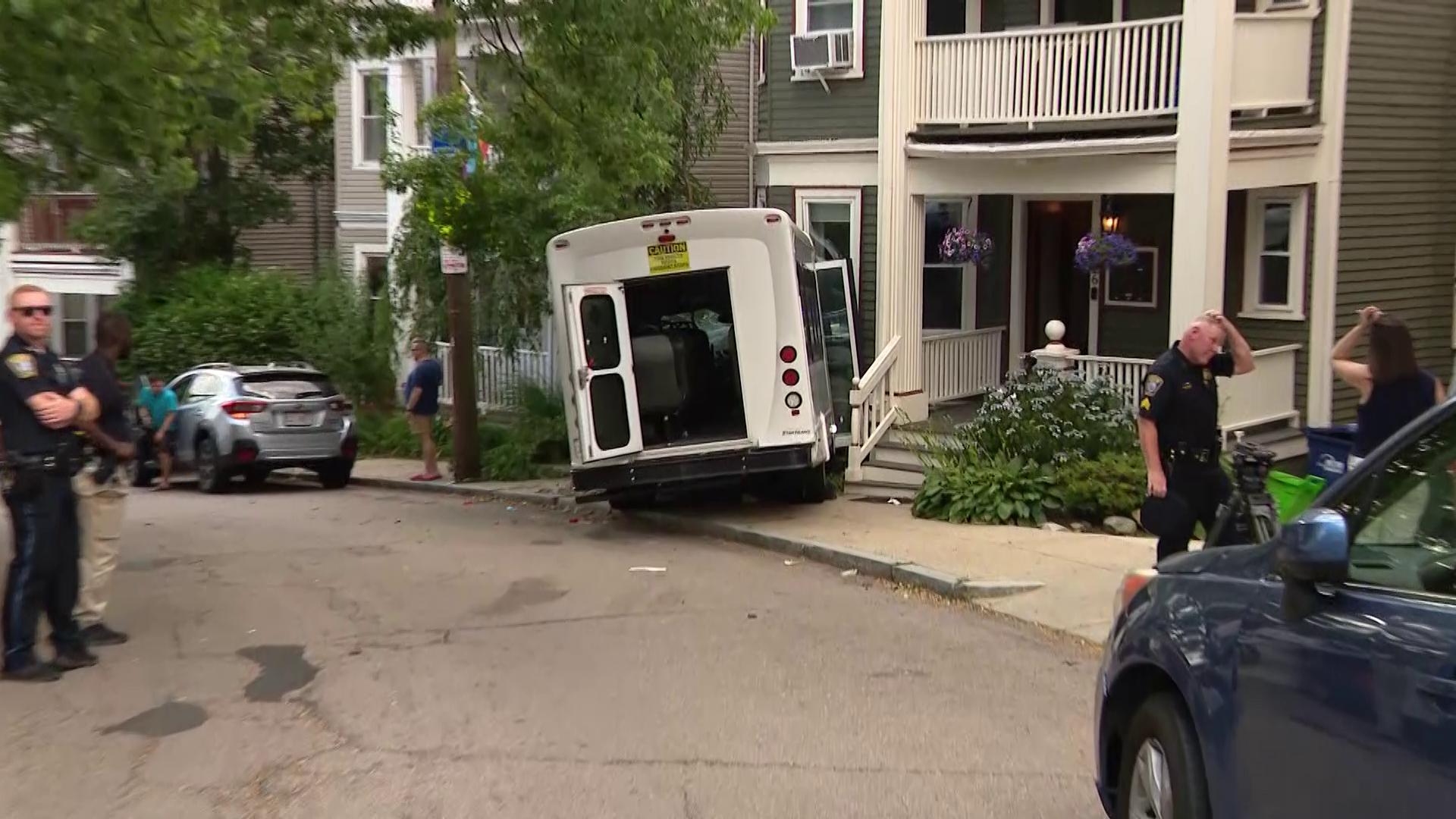 Van Crashes into Boston Home: 14 Hospitalized in Aftermath