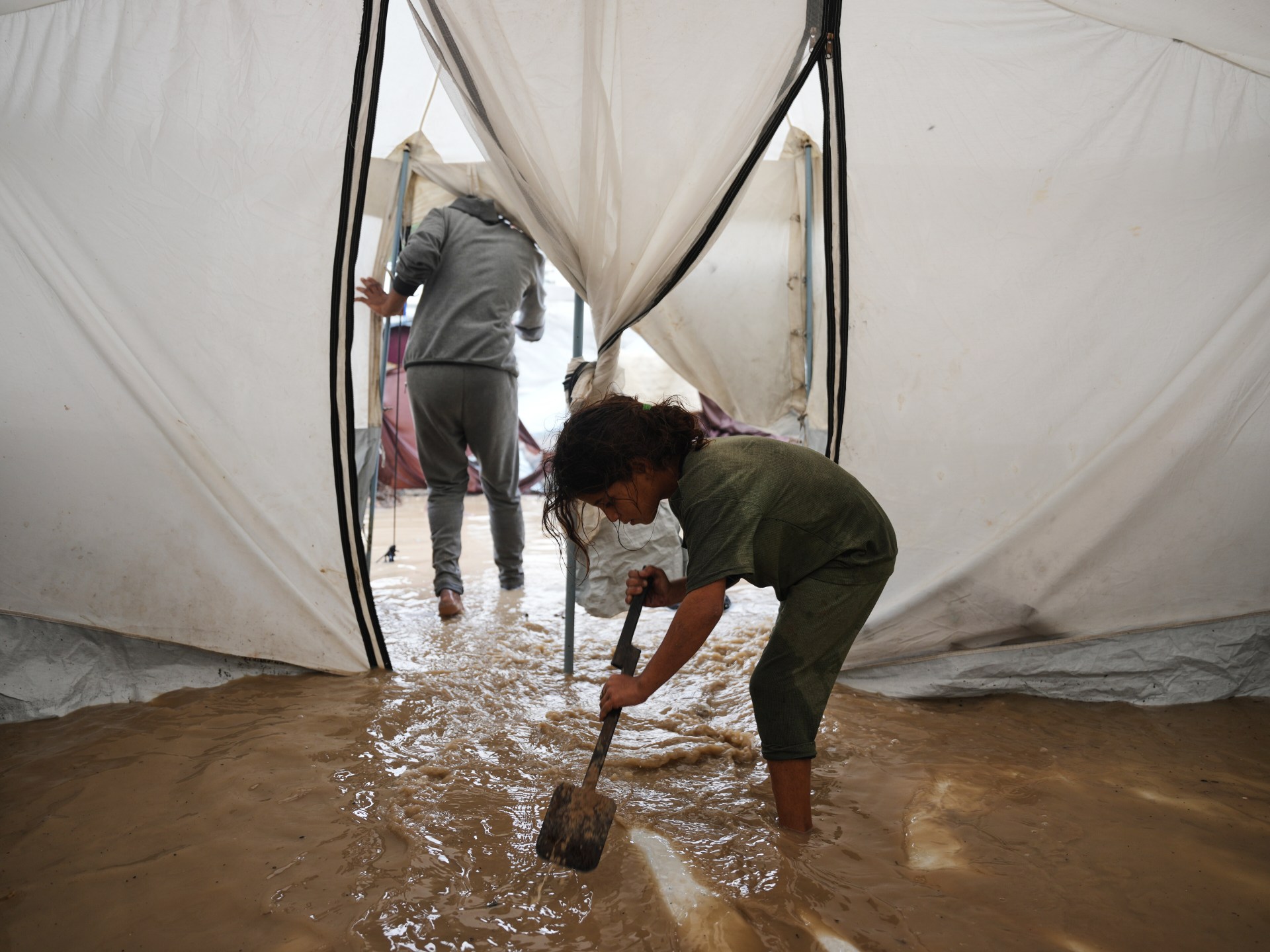 Gaza's Displaced Face Dire Winter: Storms & Floods Worsen Humanitarian Crisis Amid Israeli Siege & Aid Shortages