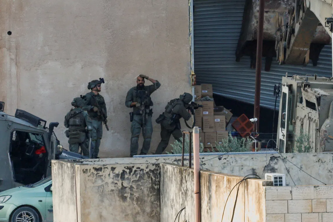 Israeli Forces Kill Two Palestinians in West Bank Raid Amid Surrender Claims; Investigation Launched