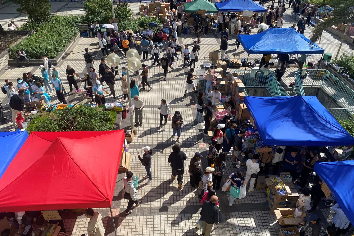 Hong Kong Rallies: Volunteers, Corporations, & Government Unite for Deadly Tai Po Fire Victims