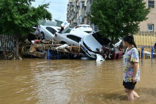 China Floods: Villagers Clean Up After Deadly Torrential Downpours