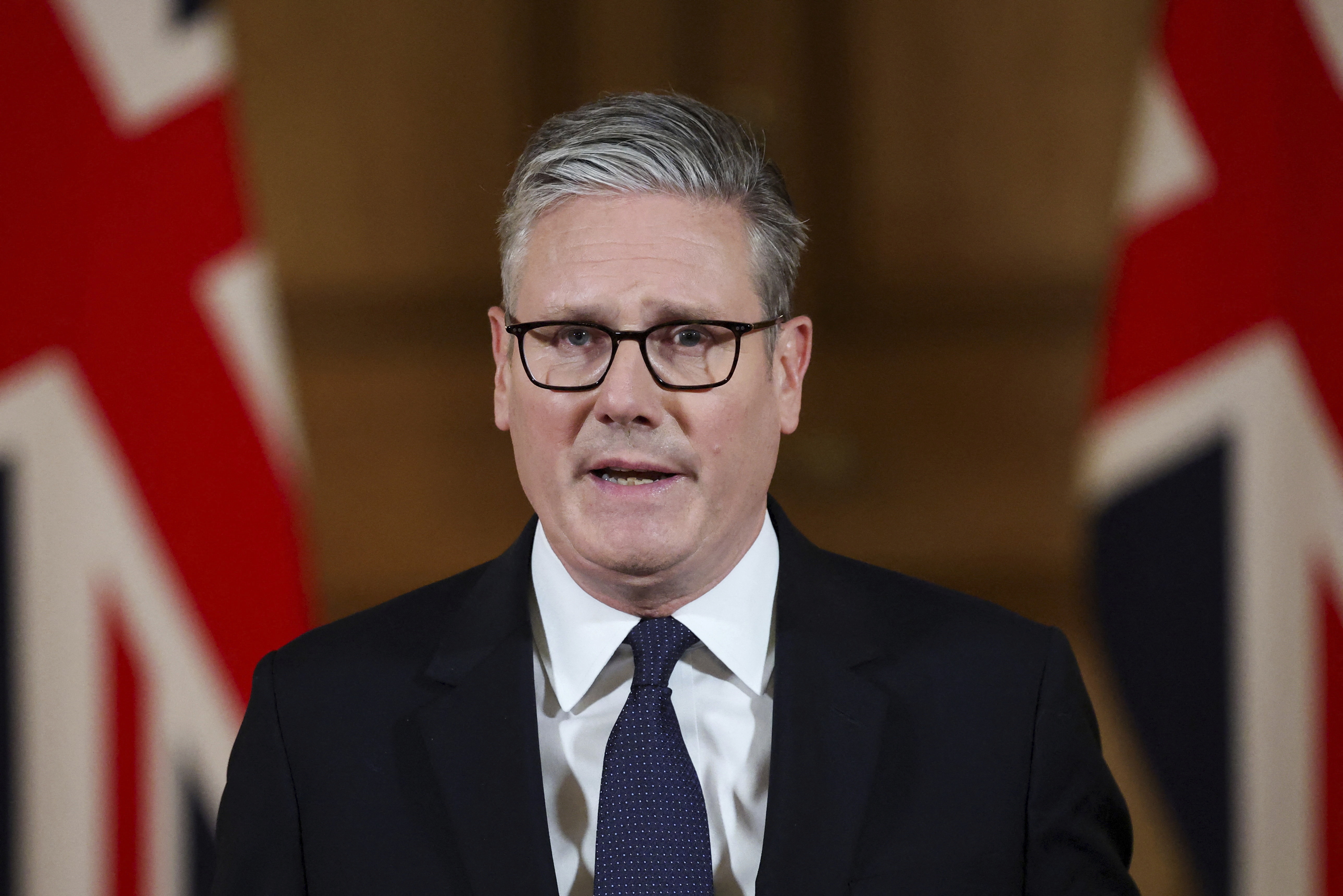 Starmer Pledges Palestinian State Recognition Contingent on Israel's Gaza Policy Shift