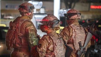 US Asylum Halt & National Guard Shooting: Suspect Charged with Murder Amidst Major Policy Shift