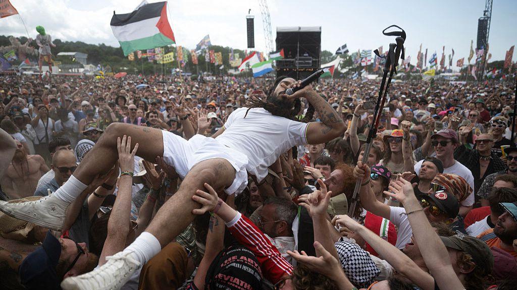 BBC Apologizes for Livestreaming Bob Vylan's 'Antisemitic' Chants at Glastonbury
